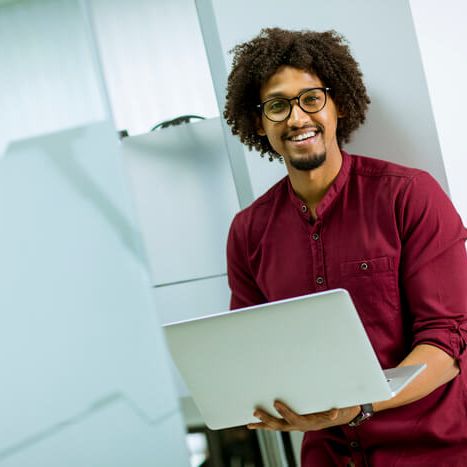 happy-young-african-american-it-specialist-wearing-2025-02-21-07-00-15-utc (1)